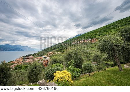 Aerial View Of The Lake Garda (lago Di Garda) With The Small Village Of Castelletto Di Brenzone, Bre