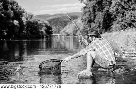 Making Me Happy. Mature Bearded Man With Fish On Rod. Successful Fisherman In Lake Water. Hipster Fi