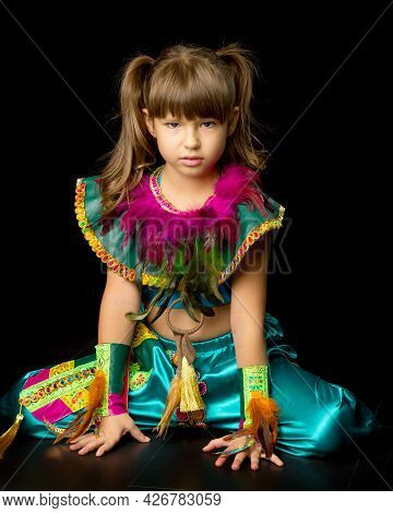 Pretty Little Girl Crawling On Floor. Portrait Of Beautiful Preteen Girl Dressed Bright Ethnic Costu