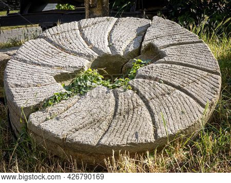 Grinding Stone From An Old Windmill, Broken In Two Pieces. Sobotka, Poland.