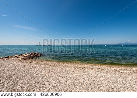 Beautiful Beach On Lake Garda (lago Di Garda) Between The Small Villages Of Cisano And Bardolino. Ve