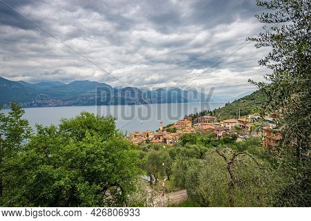 Aerial View Of The Lake Garda (lago Di Garda) With The Small Village Of Castelletto Di Brenzone, Bre