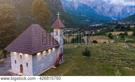 A Catholic Church In The Village Of Theth In Prokletije In The Acursed Mountains Of Albania. The Com