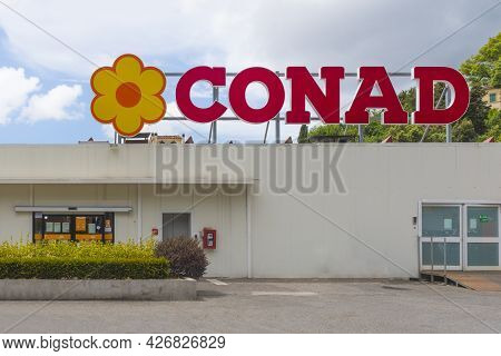 Carrara, Italy - July 12, 2021 - The Main Entrance To A Conad Mall In Italy