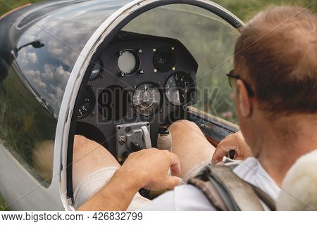 Pilot Prepares For Flight And Checks The Aerometric Instruments Altimeter Artificial Horizon Heading