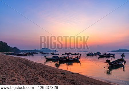Beautiful Sunrise Scenery With Fishing Boats At Rawai Beach In Phuket Island, Thailand.