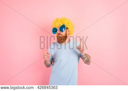Funny Serious Man With Peruke And Sunglasses Dances