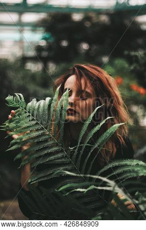 Girl With A Large Fern Leaf. Mavka. Fern. Greenery, Freshness, Forest.
