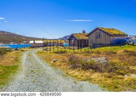 Vavatn Lake Panorama Landscape Cottages Huts Snowy Mountains Hemsedal Norway.