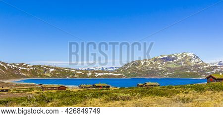 Vavatn Lake Panorama Landscape Cottages Huts Snowy Mountains Hemsedal Norway.
