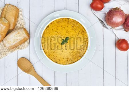 Peruvian Food, Traditional Soup A La Minuta In White Bowls, Top View.