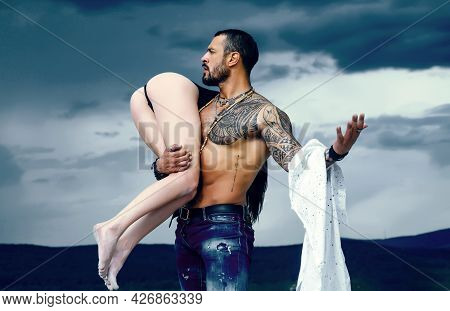 Naked Woman And Young Man. Couple In Love. Night Party Background. Beautiful Passionate Couple Is Af
