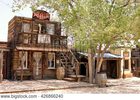July 14, 2021 In Pioneertown, Ca:  Vintage Preserved Wooden Building On A Historical Boardwalk Besid
