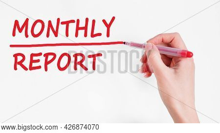 Hand Writing Inscription Monthly Report With Marker, Concept, Stock Image