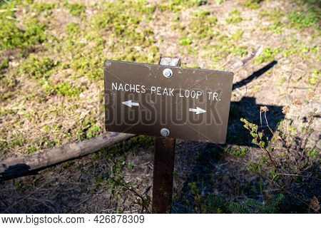 Directional Sign For The Naches Peak Loop Trail To Guide Hikers In Mt Rainier National Park In Washi