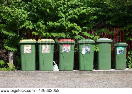 Bled, Slovenia - June 12, 2021: Trash Kind With Distinctive Color Codes Designed To Separate Waste A