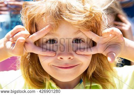 Kids Funny Face. Close Up Portrait Of Fyn Child Making Funny Expressions.
