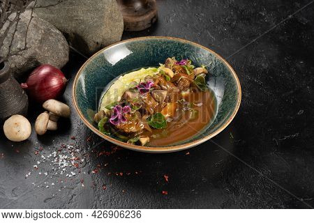 Roast Beef With Mashed Potatoes, Sweet Onions And Demiglas Sauce