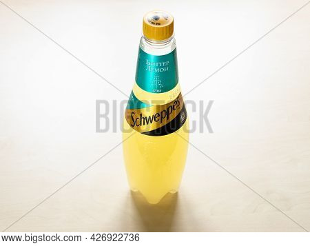 Moscow, Russia - June 10, 2021: Russian Edition Plastic Bottle Of Schweppes Bitter Lemon Water On Li