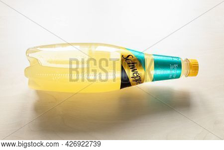 Moscow, Russia - June 10, 2021: Lying Russian Edition Plastic Bottle Of Schweppes Bitter Lemon Water