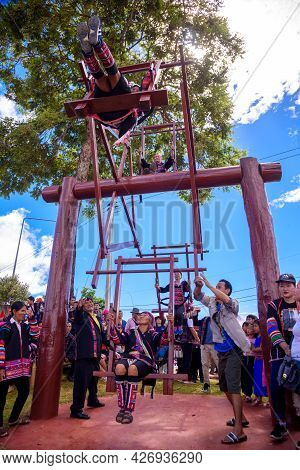 Akha Tribe Playing With The Wooden Swing On Akha Swing Festival At Doi Mae Salong. The Annual Akha S