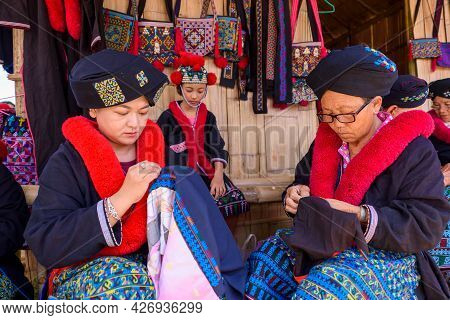 Unidentified Female Mien Hilltribe Embroider Pattern Colored Thread At Doi Mae Salong.