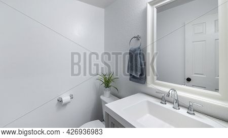 Pano Bathroom Design With Plain White Walls And Vanity Sink