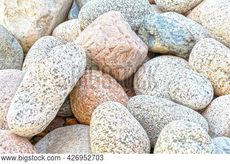 Natural Stones. The Texture Of Stones Of Different Sizes And Colors. Stone Background.