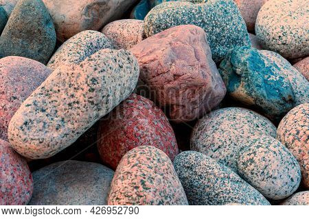 Natural Stones. The Texture Of Stones Of Different Sizes And Colors. Stone Background.