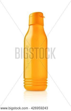 Tupperware Plastic Bottle. Plastic Orange Drinking Bottle With Valves Isolated On White Background. 