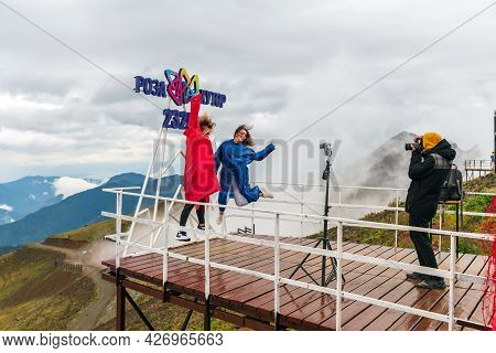 Sochi, Russia - October 2, 2020: Young Caucasian Women Making Fun Posing At Camera In Front Of Rosa 