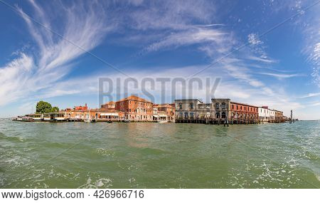 Murano, Italy - July 1, 2021: Panoramic View To Canal In Murano, The Island Of Venice With Historic 