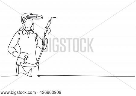 Single Continuous Line Drawing Of Young Attractive Female Welder Holding Hands On Hip. Professional 