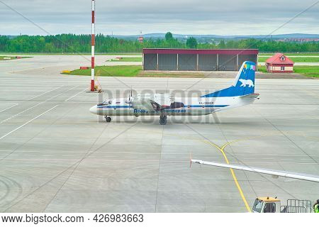 Khabarovsk, Russia - May 26, 2021: Antonov An-26 - 4506 Ra-26604 Polyarnye Avialinii Traveling Along