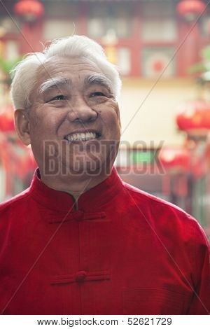 Portrait of senior man in Chinese traditional clothing