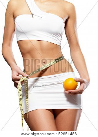 Beauty Female Body With Measuring Tape And Orange