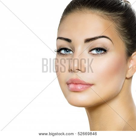 Beauty Woman Portrait. Beautiful Brunette with Blue Eyes. Perfect Fresh Skin. Isolated on White Background