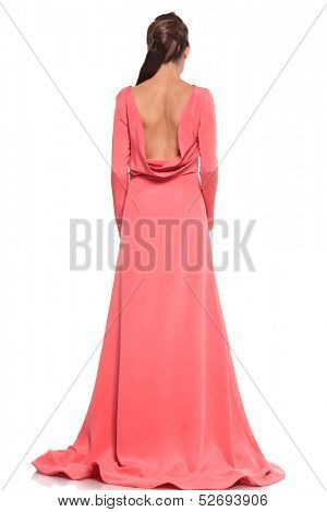 back view of a woman in a pink gown with naked back on white background