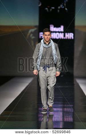 ZAGREB, CROATIA - OCTOBER 19: Fashion model wearing clothes designed by Ivica Klaric on the 'Fashion.hr' show on October 19, 2013 in Zagreb, Croatia.