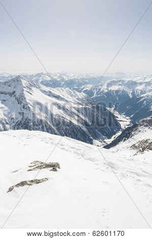 Alpine Valley Surrounded With Mountains