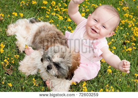 Happy Baby And A Puppy