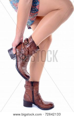 person with a pair of brown boots