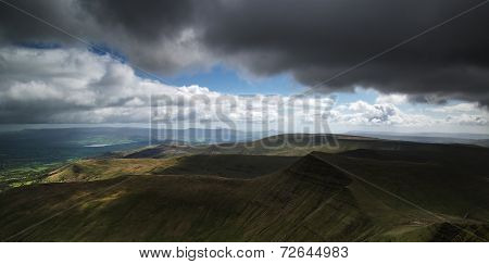 Beautiful Landscape Of Brecon Beacons National Park With Moody Sky