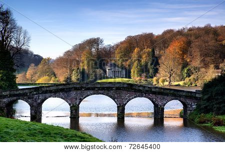 Bridge Over Main Lake In Stourhead Gardens During Autumn.