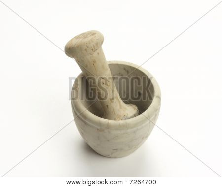A mortar and pestle on white background