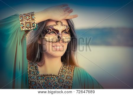 Young Woman Wearing Mask  and Oriental Dress