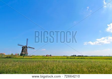 Windmill and farmland