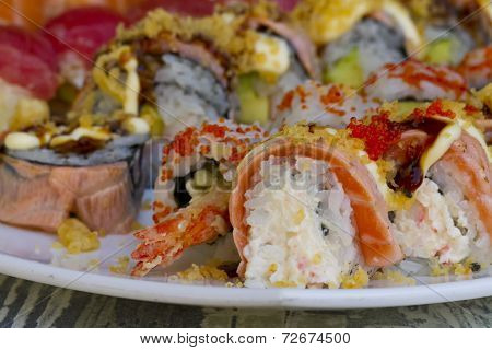 Sushi rolls with vassabi on the plate