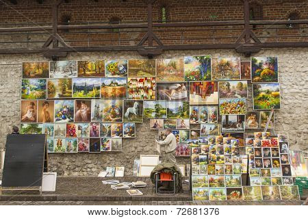 Artist selling his paintings