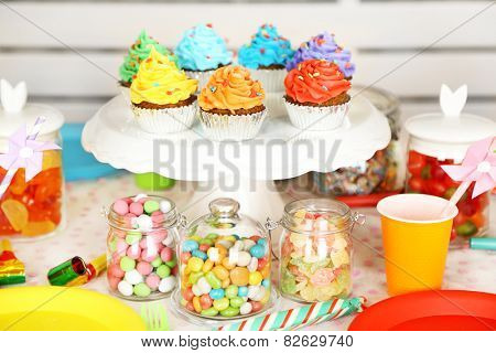Prepared birthday table with sweets for children party